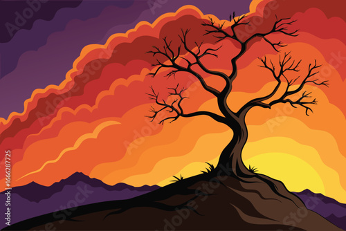 Silhouette of a bare tree against a dramatic fiery sunset sky