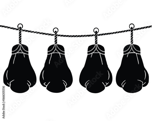 Four black boxing gloves hanging on a rope
