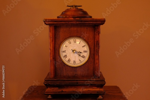 antique clock on a shelf
