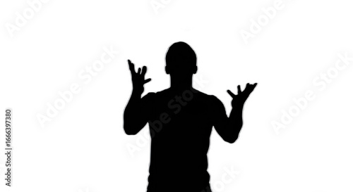 Silhouette of a person with hands raised in a gesturing pose against a black background