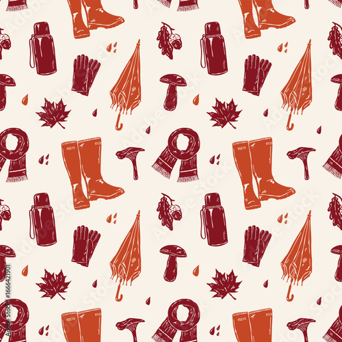 Hand drawn vector seamless autumn doodle pattern featuring rubber boots, umbrella, scarf, gloves, leaves, acorns and mushrooms. Cozy seasonal design for cards, posters and backgrounds