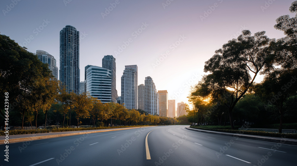 Fototapeta premium City skyline at sunset with a road and gentle lighting