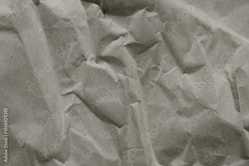 Brown crumpled recycled paper texture background. Kraft Paper