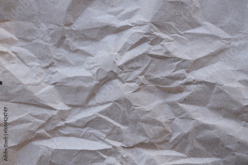 Brown crumpled recycled paper texture background. Kraft Paper
