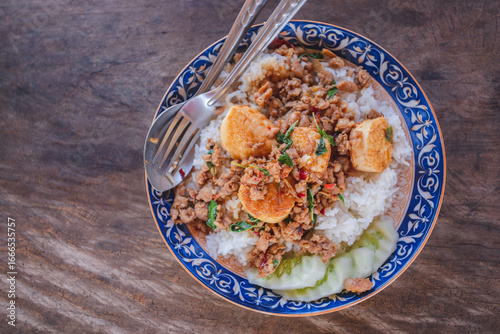 Rice topped with stir-fried pork and egg tofu