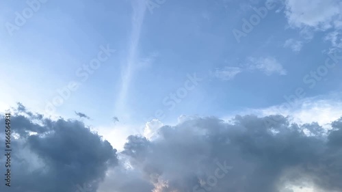 Dynamic timelapse of the sky filled with clouds drifting and shifting, creating a dramatic and ever-changing atmosphere.