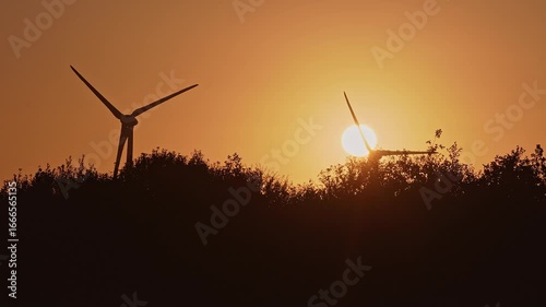 Danish sunrise between windmills in slow motion 4k: 2025