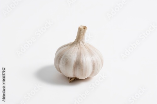Clove of garlic on a plain white backdrop, fresh, organic, nutritious vegetable
