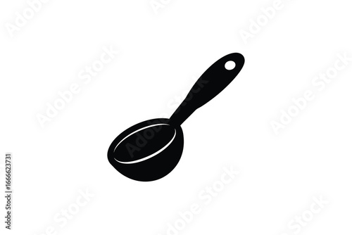 A black spoon with a hole in the handle on a white background silhouette