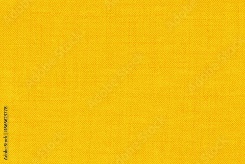 Yellow golden linen fabric cloth texture for background, natural textile pattern.