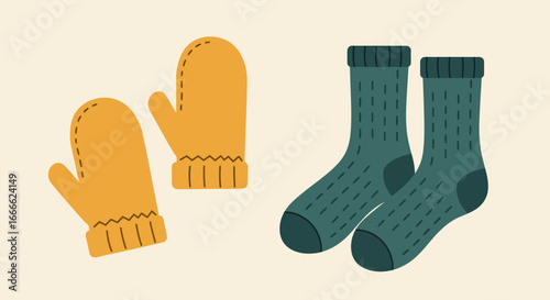 Two yellow mittens and two green socks on an offwhite background