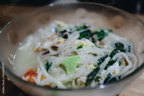 Wallpaper Mural Delicious Bowl of Noodle Soup with Fresh Vegetables and Savory Broth for a Comforting Meal Experience Torontodigital.ca