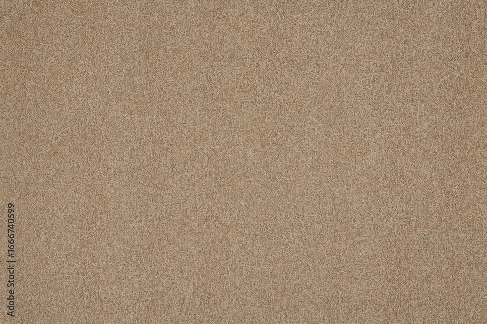 Fototapeta premium Detailed close-up of aged textured burlap fabric, rustic backdrop in neutral tones of tan, brown, and grey. Macro canvas design. Linen texture under natural lighting.