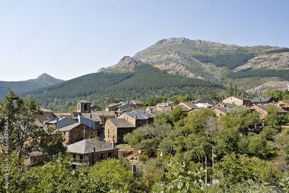 Fototapeta premium View of the town of Valverde de los Arroyos, typical black architecture built with slate