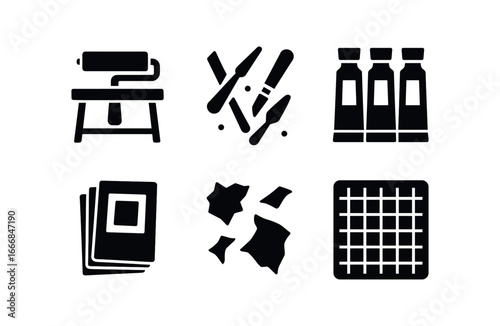vector solid black filled icons ink roller (workspace): printing table scattered tools tubes of ink stack of prints paper scraps cutting mat.