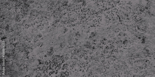 Grungy textured surface featuring speckled granular pattern with varied tonal shades suitable for backgrounds and decorative projects