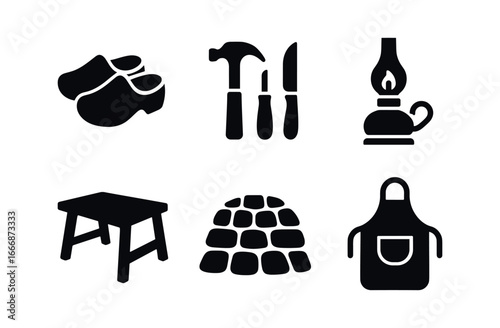 vector solid black filled icons cobbler (historic): wooden clogs hand tools oil lamp rustic table cobblestone floor cloth apron.