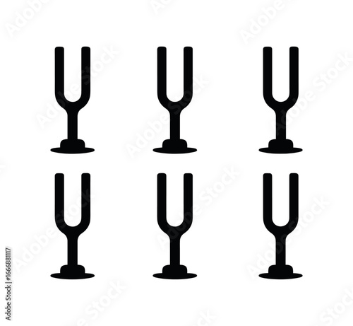 vector solid black filled icons tuning fork (standard type): silver fork flat base smooth handle polished metal table shadow clean backdrop.