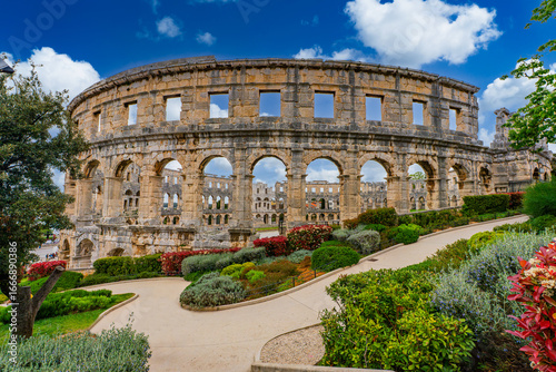 Pula, Croatia, 18 April 2025 - Exterior of the Pula Arena, the old roman theater in the old town of Pula