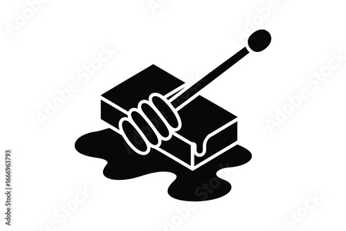 Black and white honey block with dipper and dripping honey