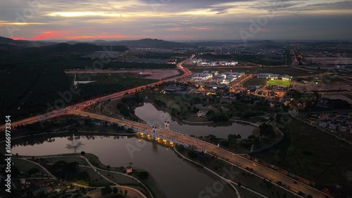 Modern Township with Solar Panel Rooftops and Lakefront Park in Malaysia