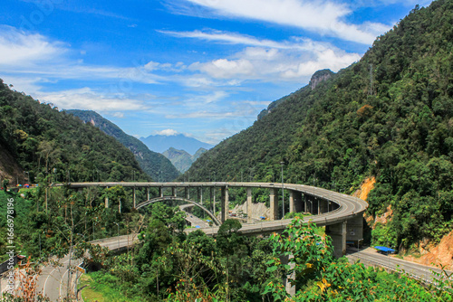 Curved Elevated Highway in the Middle of Tropical Mountain Forest – Kelok 9, West Sumatra, Indonesia
