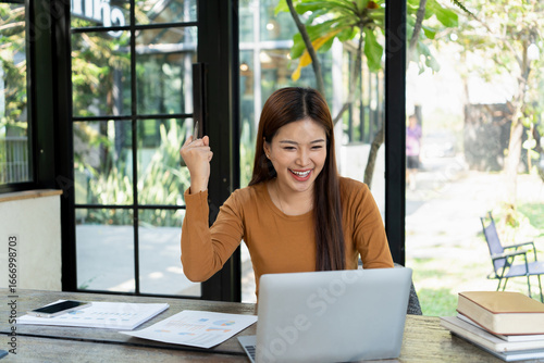 Photography Young businesswoman celebrated her success.