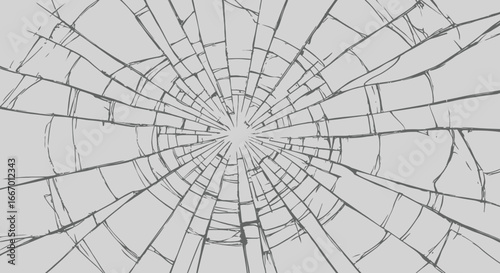 Dramatic shattered glass effect with radiating cracks and bright center light