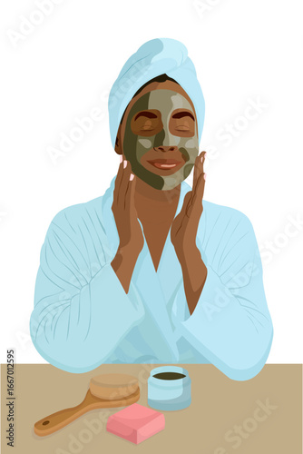 An illustration of a woman with a green face mask, wearing a blue robe and towel, applying the mask with skincare products on a table, on a white background.