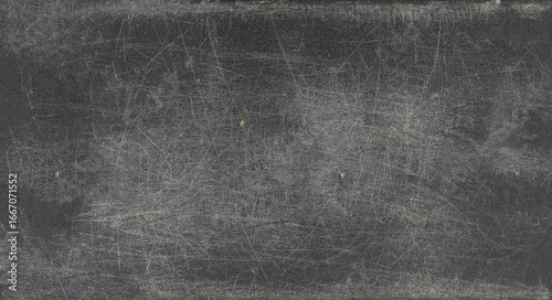 Scratched plastic surface with rough texture, seen up close