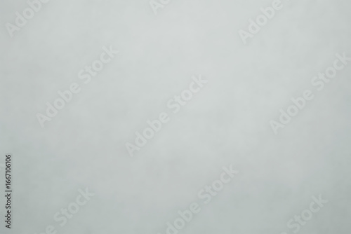 Subtle textured background of light gray with a faint gradient effect