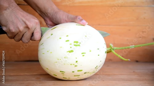 Split the fresh white melon on the plate  