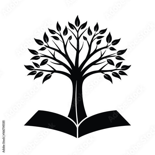 silhouette of a tree growing from open book 