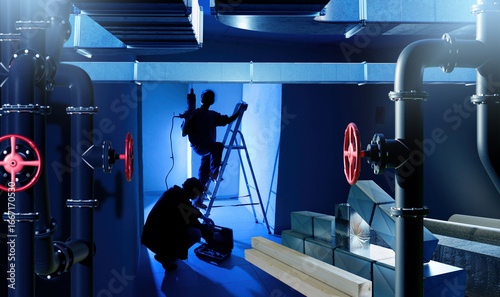 Workers installing ventilat...