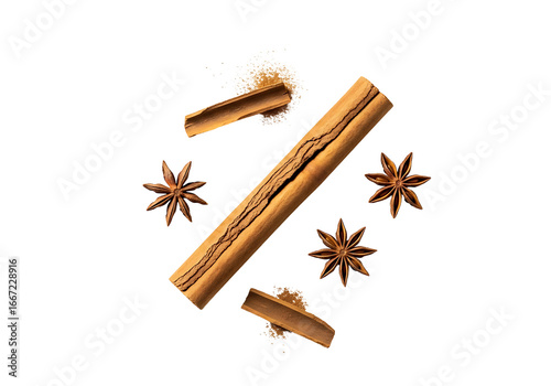 Cinnamon sticks, star anise, and ground spice, artfully arranged against a black background, creating a warm and inviting composition.