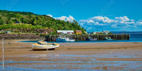Lobster Trawler at low tide near Sandy Cove, Nova Scotia Canada.