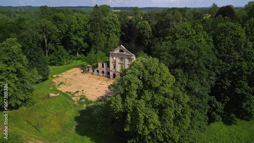 Wallpaper Mural Stunning Aerial Footage Capturing Overgrown Ruins Beautifully Surrounded by Lush and Vibrant Greenery and Plants Torontodigital.ca