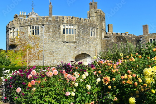 Dry moated historical castle in summer among sunflowers and dahlias in Walmer near Deal England on the Kentish coast within an easy reach on South Eastern train from London Saint Pancras International