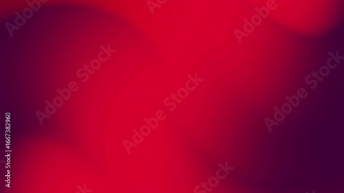 A blurred gradient image in deep crimson and dark purple