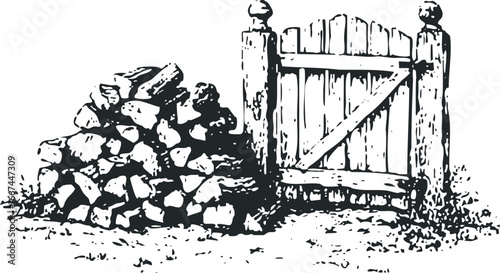 Wooden gate with stacked rocks and grassy ground
