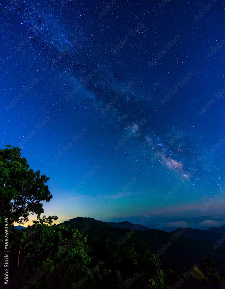 Naklejka premium Milky Way over Mountains