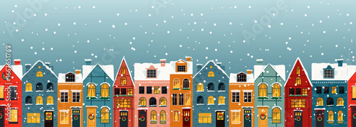 A Charming Winter Village Scene Featuring Colorful Houses Surrounded by Beautiful Snowflakes