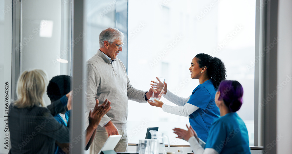 Obraz premium Award, doctors and thank you with people in meeting for healthcare breakthrough, research grant and prize. Medical milestone, applause and support with nurses in hospital boardroom for trophy