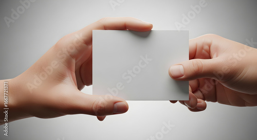 hand holding blank business card
