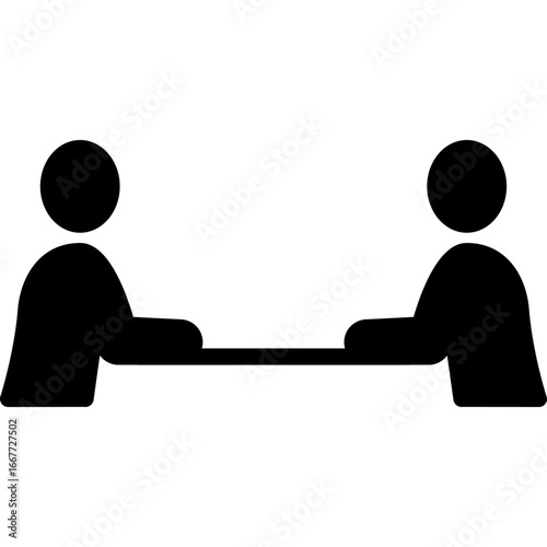 Two people at a table representing political negotiations, debates, and mediation