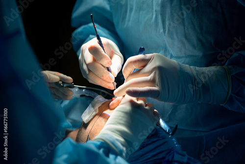 surgeons perform plastic surgery