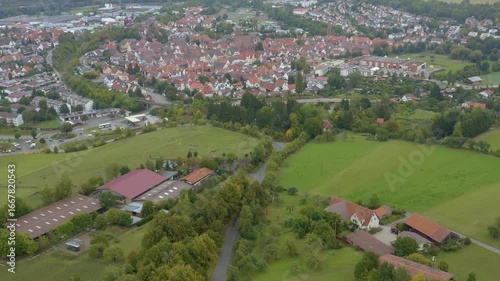 Aerial view of the old town city Weik der Stadt in Germany. On a cloudy day in Summer.