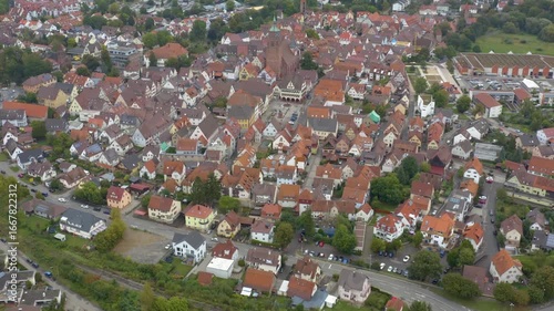 Aerial view of the old town city Weik der Stadt in Germany. On a cloudy day in Summer.