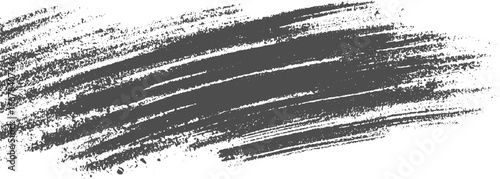 A textured grey brush stroke pattern with rough edges and scattered dots on a white background.