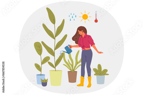 Woman florist grows houseplants in greenhouse, watering flowers with water and fertilizer. Girl from flower shop or greenhouse works as florist, enjoying growing plants to decorate interior of house.